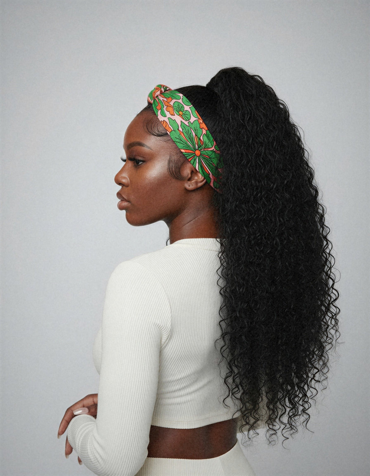 Perruque bandeau bouclée deep wave vue de dos